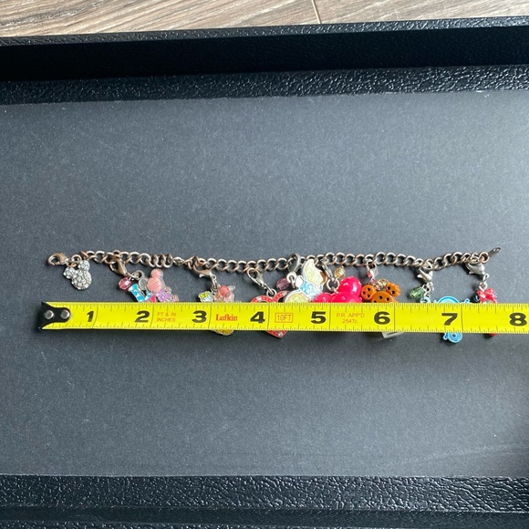 Disney charm bracelet with 7 charms plus the silver toned Mickey head - Picture 7 of 10